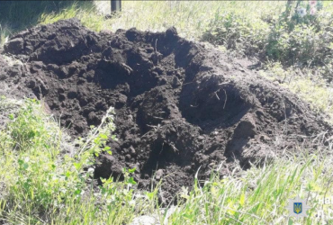 На Харківщині знайшли поховання військових РФ, серед них - підполковник (фото)