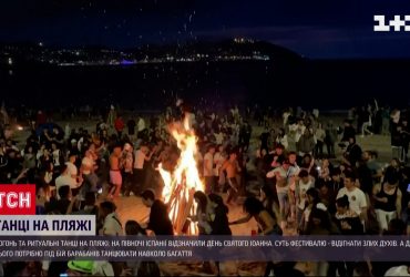 Танцы с бубонами на пляже: испанцы праздновали день Святого Иоанна, прыгая через костры