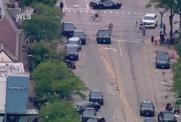 During a parade in the suburbs of Chicago, an unknown person opened fire