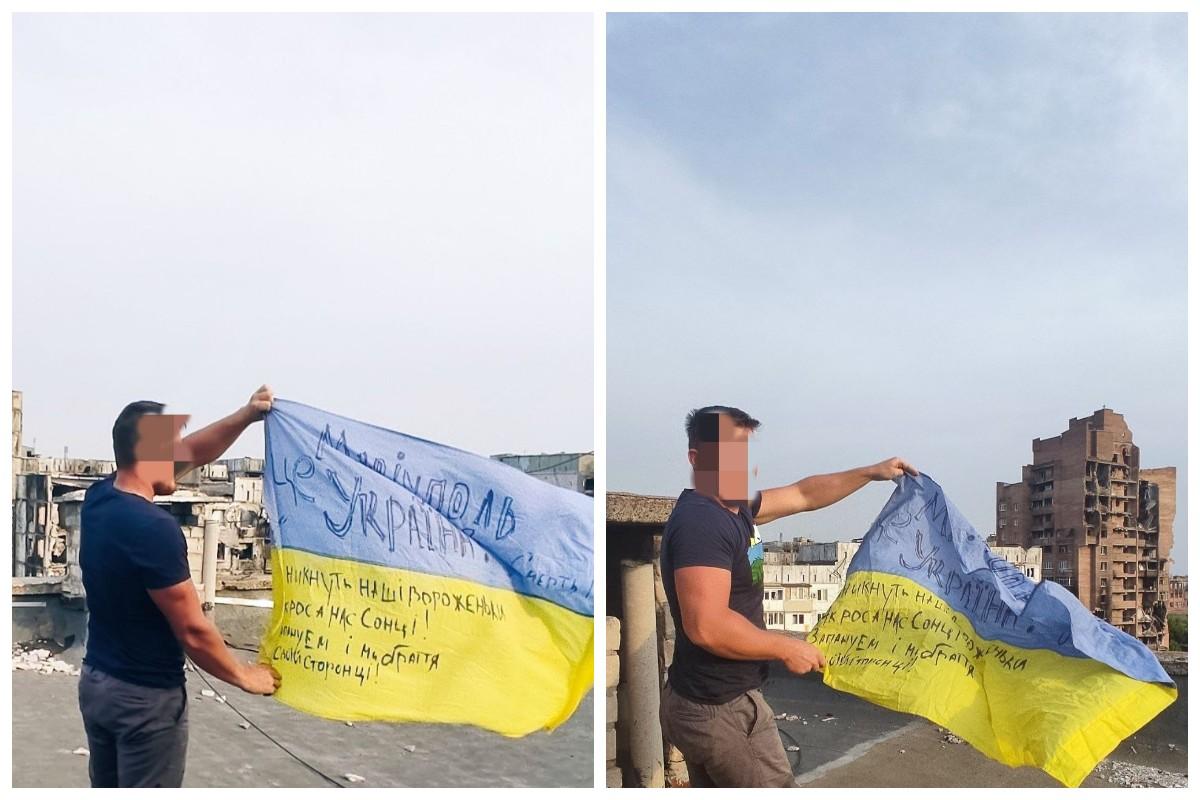 В окупованому Маріуполі чоловік розгорнув прапор України / міськрада Маріуполя у Telegram В окупованому Маріуполі чоловік розгорнув прапор України / міськрада Маріуполя у Telegram