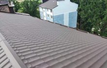 В Ірпені за підтримки спонсорів відновили знищену окупантами покрівлю багатоквартирного будинку