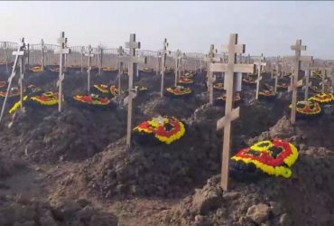 Безіменні могили та фірмові вінки: у мережі показали величезне кладовище Вагнера (відео)