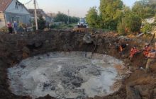 Нічний удар по Дніпропетровщині: в ОВА уточнили пошкодження та показали вирву (фото)