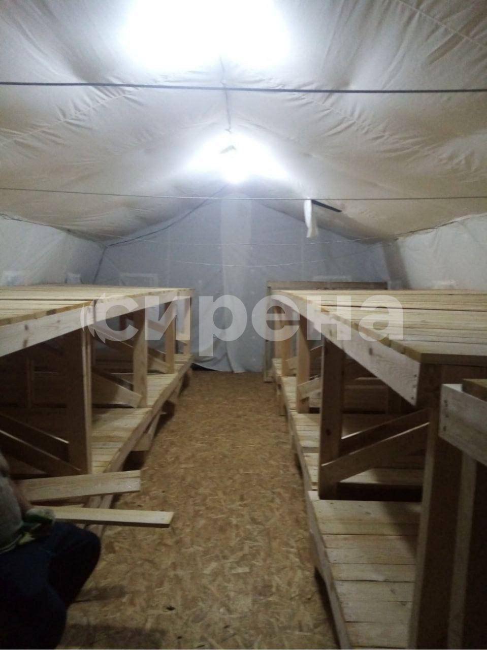 Палатки и деревянные нары: появились фото из лагеря для 'Вагнера' в Беларуси Палатки и деревянные нары: появились фото из лагеря для 'Вагнера' в Беларуси