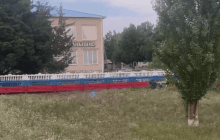 До жителів Херсонщини приїхали "розбиратися" через паркан в кольорах прапора України (відео)