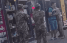 В Киеве военные с пистолетом задержали прохожего: появилась реакция полиции (видео)