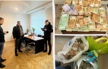 У депутата Ривненского облсовета нашли коллекцию пакетов, набитых долларами и евро (фото)