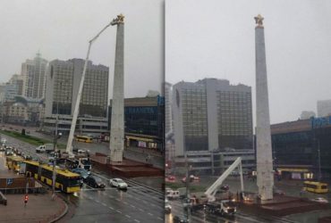 В Киеве на площади Победы снимают главную звезду СССР с обелиска (фото, видео)