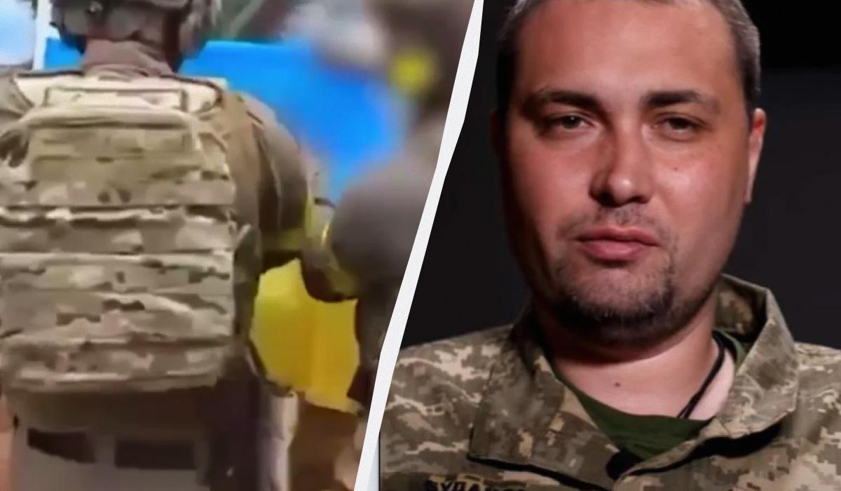 На відео глава розвідки підписує прапор / Колаж УНІАН / Скріншоти На відео глава розвідки підписує прапор / Колаж УНІАН / Скріншоти