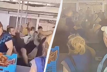 Укус та кидання помідорами: на ринку Херсона люди побилися з поліцейськими (відео)