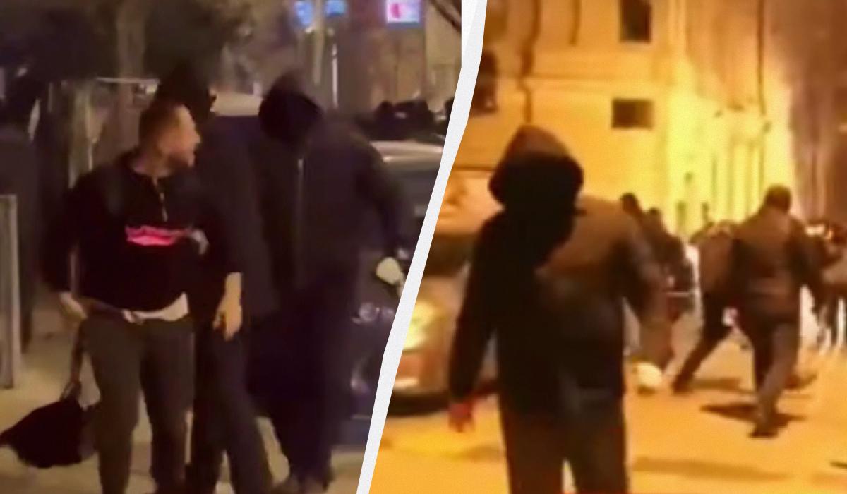 Нападавшие одеты в черную одежду и черные маски / колдаж УНИАН, кадры из видео Нападавшие одеты в черную одежду и черные маски / колдаж УНИАН, кадры из видео