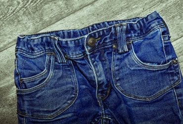 Чому на кишенях джинсів збереглися маленькі металеві заклепки